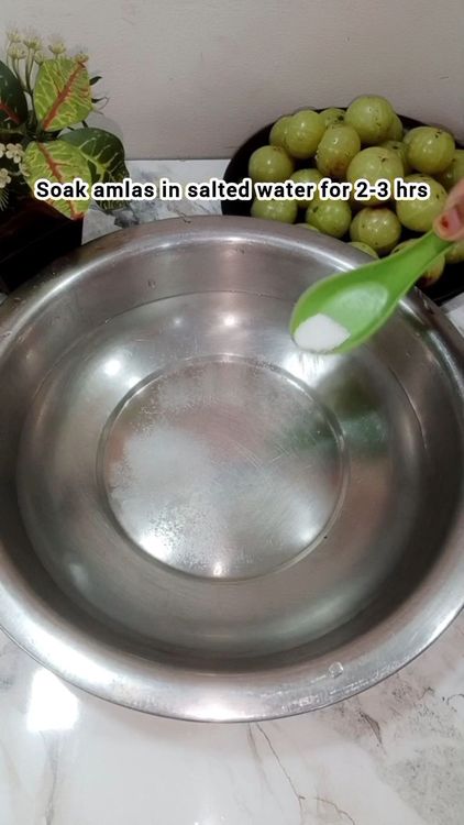 Step 1.3: Wash Amla, pierce using fork and soak them in salted water for 3 hrs