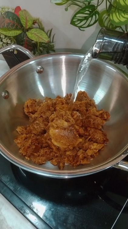 Step 1.1: After 3 hrs, heat a deep pan add grated jaggery with 1/4 th cup water