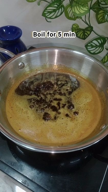 Step 1.2: After 3 hrs, heat a deep pan add grated jaggery with 1/4 th cup water