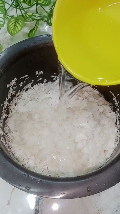 Step 1.4: Wash raw rice thoroughly in running water and soak in 1 cup of water with thin Poha for 30 min
