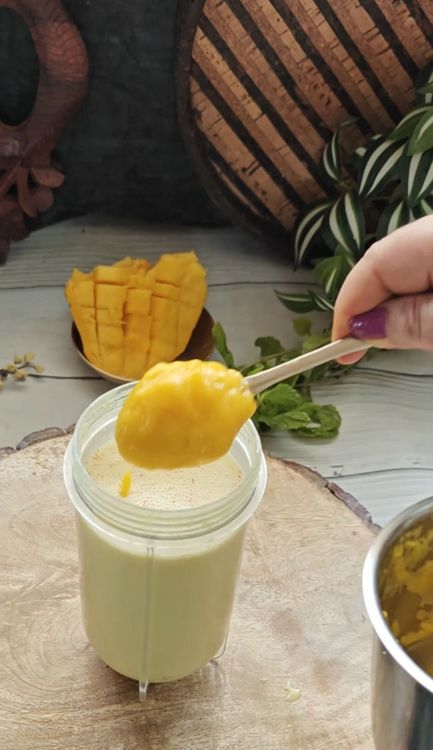 Step 1.1: Add fresh mango puree, honey, and vanilla extract to the soaked mixture