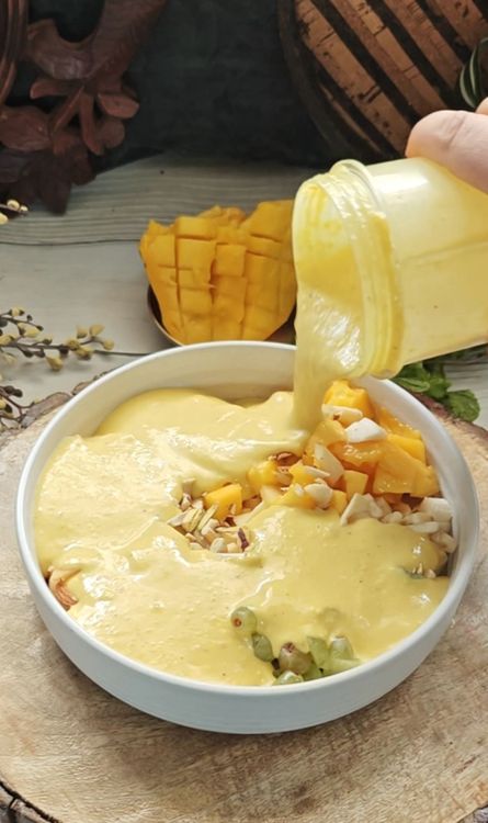 Step 2.1: Pour the blended smoothie over the fruits and mix well