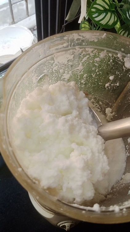 Step 2.1: Using a hand whisk, electric beater, or traditional churner, churn the cream until the butter separates