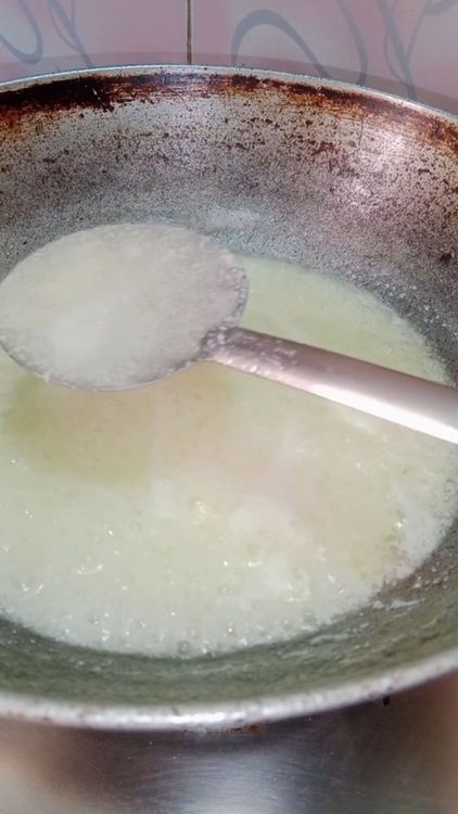 Step 1.2: As the white butter ( loni ) melts, it will start bubbling and frothing