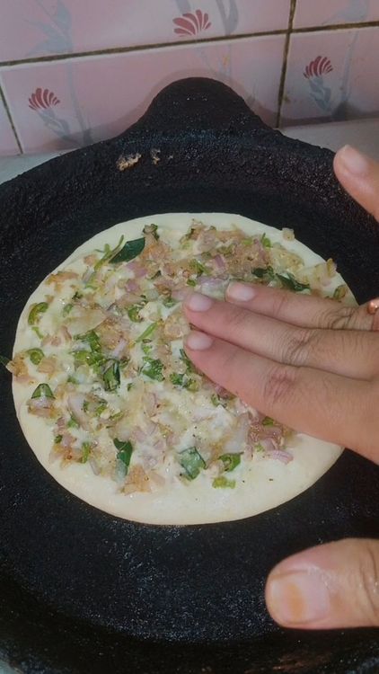 Step 1.2: Heat cast iron tawa on medium flame, splash some drops of water to check temperature