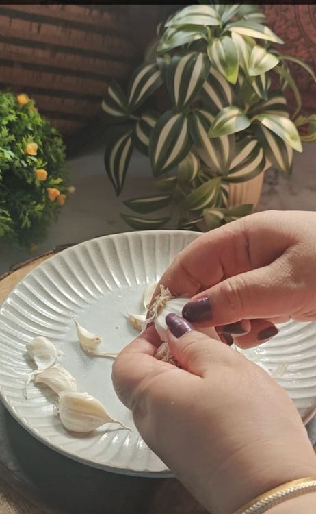 Step 1.1: Break the garlic bulb into individual cloves