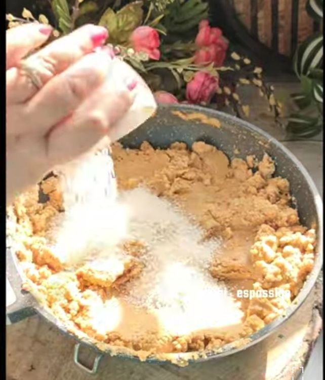 Step 3.2: Remove from flame, add the dry fruits mixture, dessicated coconut, and Desi Khand