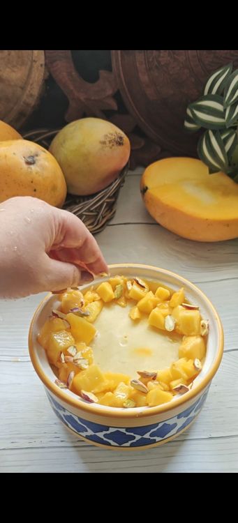 Step 1.1: Once set, top with chopped mangoes and pistachios