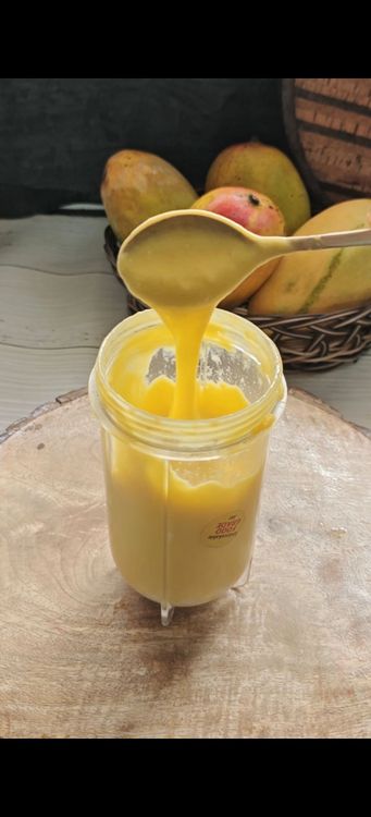 Step 1.3: Puree the mango, milk powder, and 2 tbsp milk in a blender until smooth