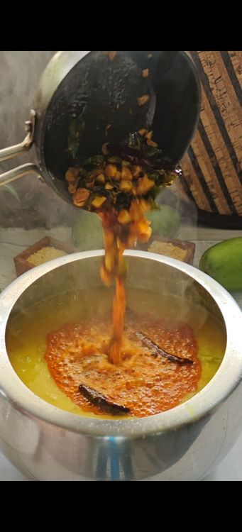Step 2.1: Pour the tempering over the dal