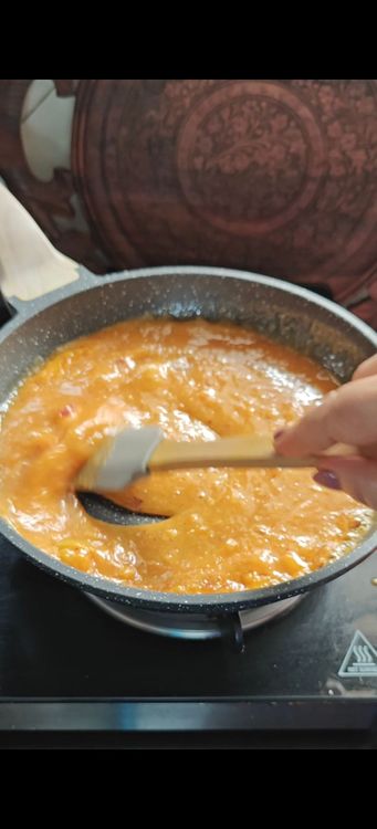 Step 1.1: Cook the blended mixture on low to medium heat until it forms a glaze-like texture