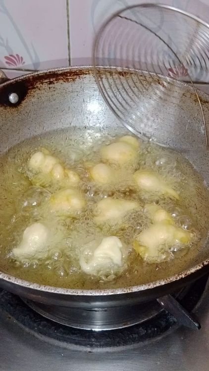 Step 1.1: Add salt and turmeric to the batter