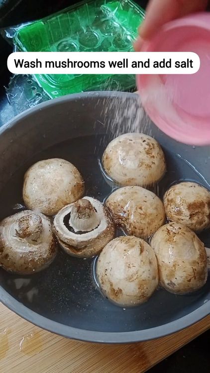 Step 1.1: Add salt and rub the mushrooms gently using your fingers to remove dirt