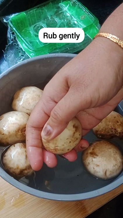 Step 1.2: Add salt and rub the mushrooms gently using your fingers to remove dirt