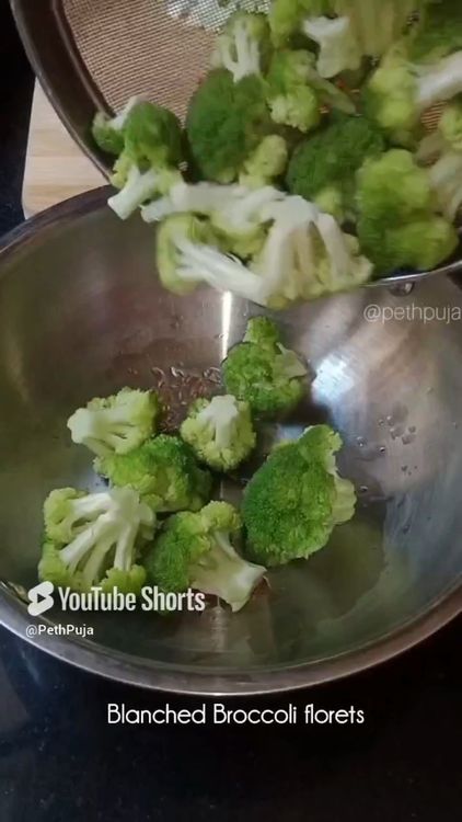 Step 1.1: Toss the blanched florets with oil, cumin seeds, and salt