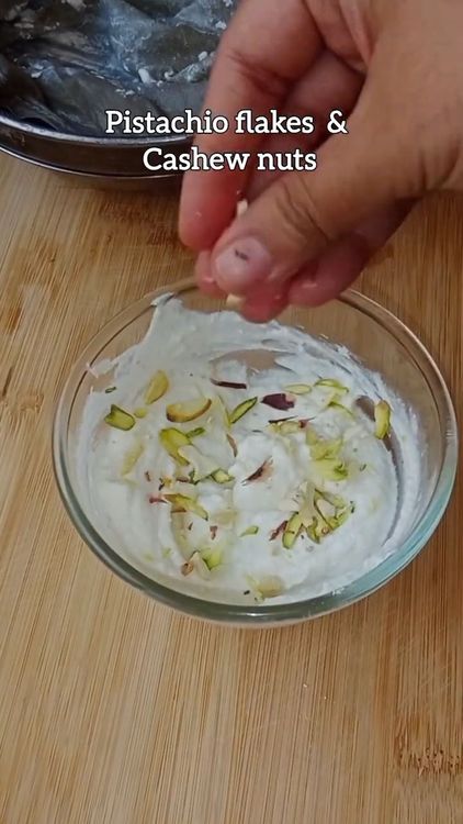 Step 2.2: Add chopped pistachio and cashews, sugar powder, and nutmeg powder