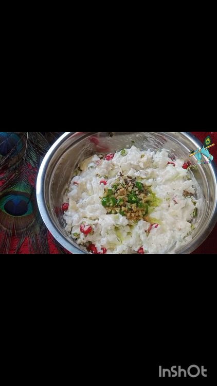 Step 2.1: Pour the tempering over the poha mixture and mix gently