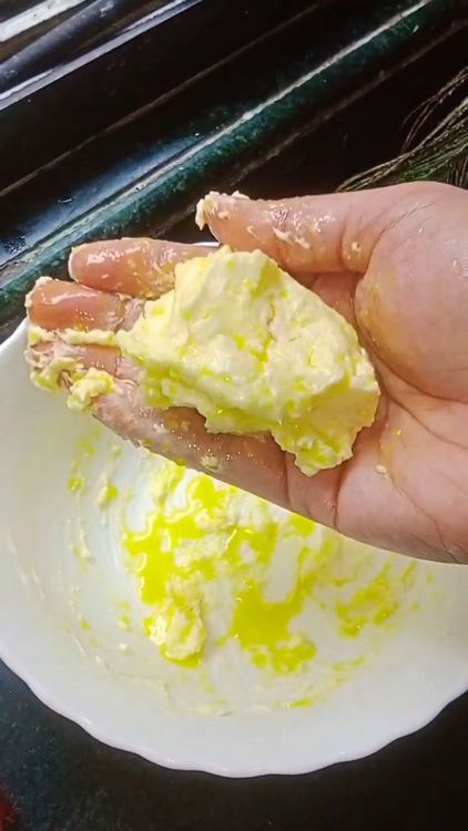 Step 1.1: Collect the solidified makhan in a small mud bowl as it is traditionally served