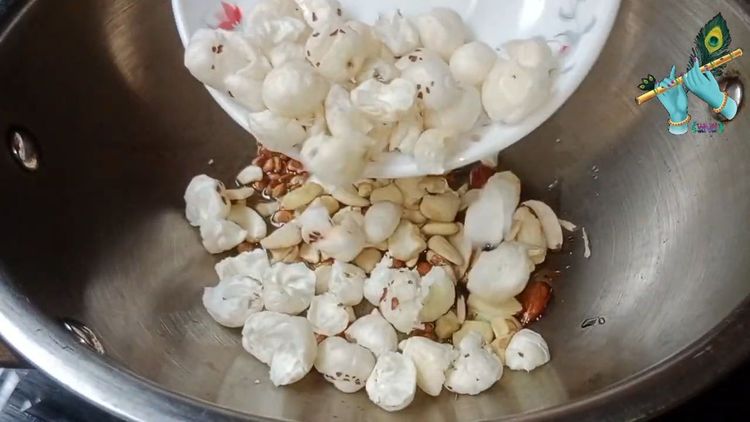 Step 1.2: In a pan, heat ghee and roast makhana along with chironji, cashews, almonds, and shredded coconut