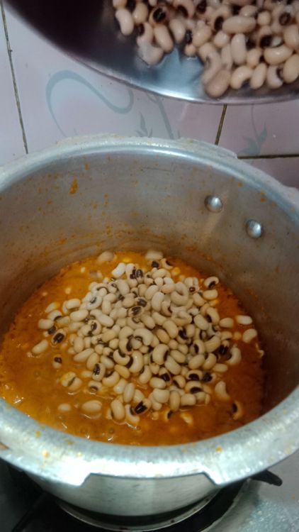 Step 3.2: Once the oil separates, Add the soaked black-eye peas, mix well
