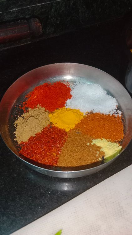Step 2.1: Add turmeric powder, kashmiri red chilli powder, coriander powder, red chilli powder, cumin powder, asafoetida, kitchen king masala or pav bhaji masala, and salt