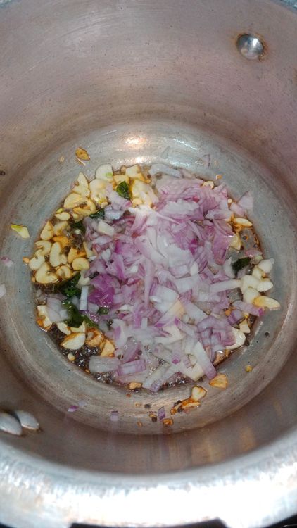 Step 2.1: Add finely chopped onion and sauté for a minute