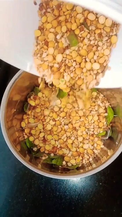 Step 1.1: Transfer the cooled mixture to a mixie jar, add asafoetida and salt