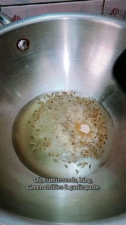 Step 1.1: Heat a pan or tava and add oil