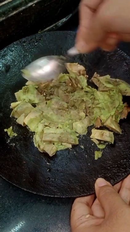 Step 1.2: Make small cuts in the avocado flesh and scoop it out onto a plate