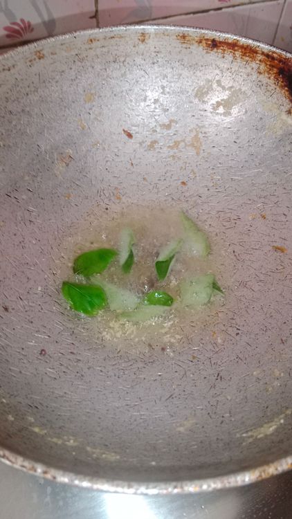 Step 1.1: Heat oil in a pan and temper mustard seeds with asafoetida and curry leaves on low flame