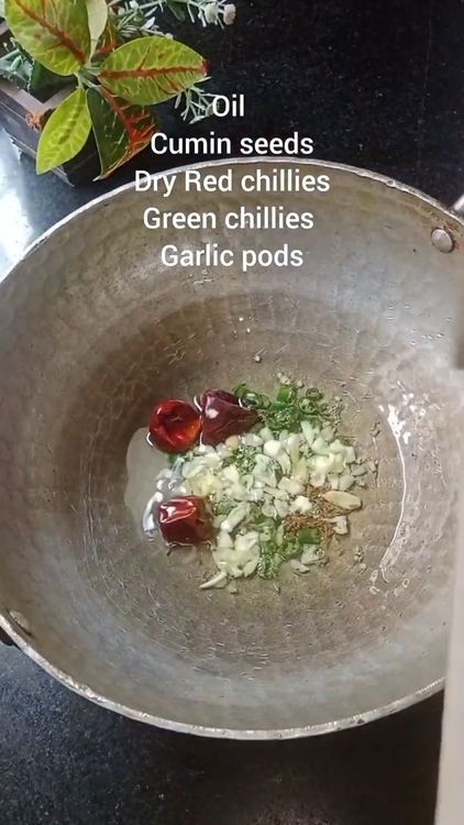 Step 2.1: Heat oil in a broad-bottomed pan