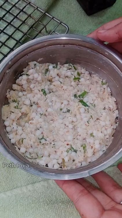 Step 1.3: Once soaked, combine sabudana with senda namak, cumin seeds, roasted crumbled peanuts, rajgira atta, grated potato, chopped green chillies, and coriander leaves (optional)