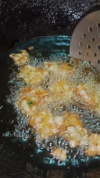 Step 1.3: Heat peanut oil in a deep-bottom pan over medium heat
