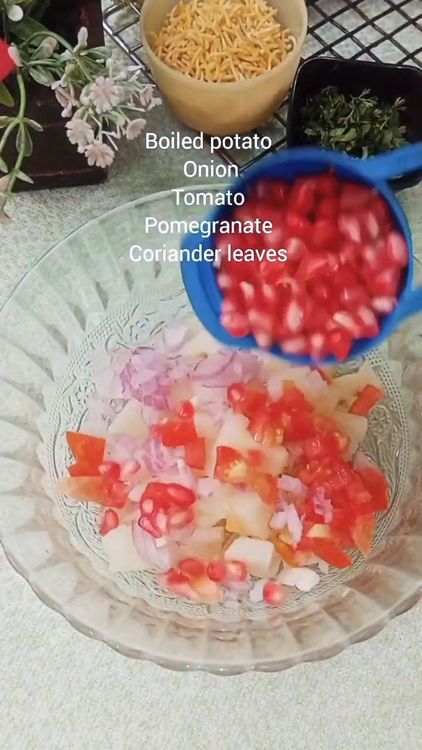 Step 1.1: In a bowl, combine the chopped boiled potato, tomato, onion, and pomegranate pods