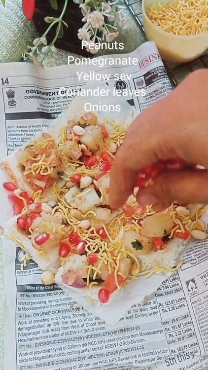 Step 3.1: Garnish with roasted peanuts, pomegranate pods, yellow sev, onions, and coriander leaves