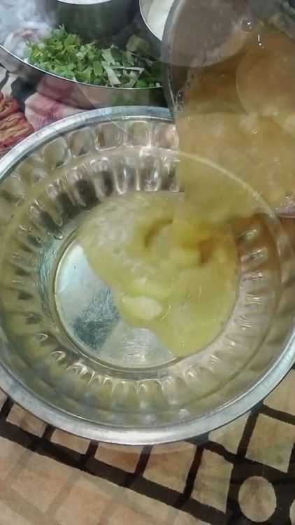 Step 1.1: In a bowl, combine the bottle gourd paste, sooji, rice flour, chilli flakes, cumin seeds, and salt