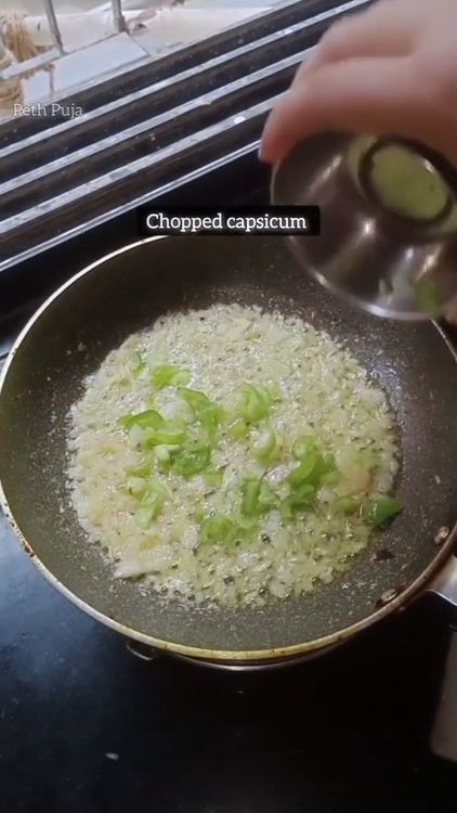Step 3.1: Add finely chopped capsicum and tomato