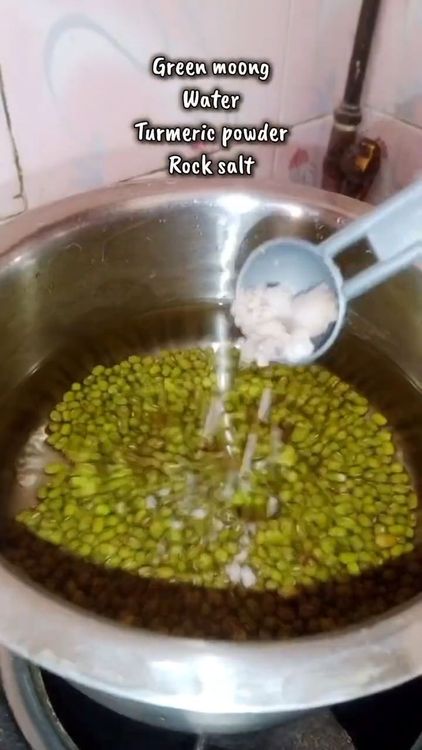 Step 1.1: In a bowl, add green moong, turmeric powder, rock salt, and water