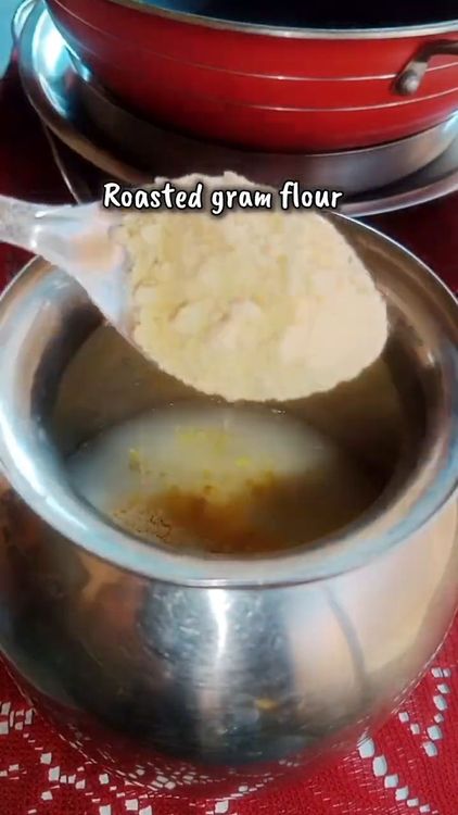 Step 2.2: In a steel jar, add curd, salt to taste, gram flour, and water