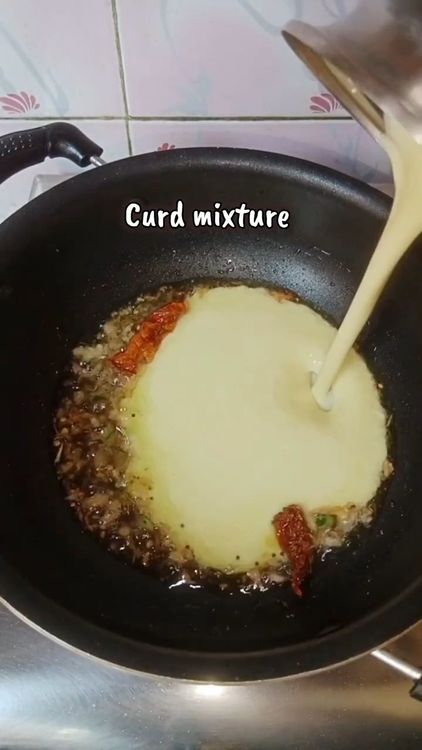 Step 3.1: Add the curd mixture along with turmeric powder, red chilli powder, and coriander powder