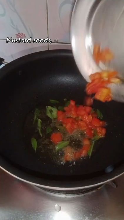 Step 2.2: Heat oil in a pan and crackle mustard seeds