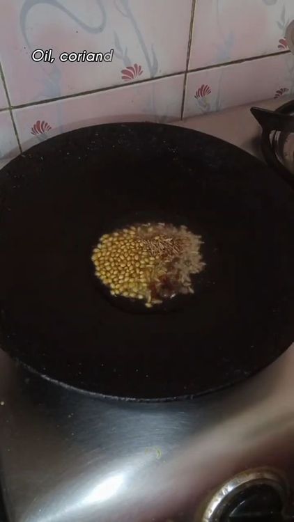 Step 1.2: Heat oil in a pan and add coriander seeds, cumin seeds, fennel seeds, black pepper corns, and cloves