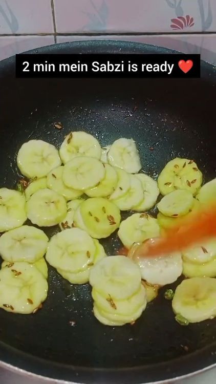 Step 1.2: Add the sliced raw bananas and toss for a few minutes