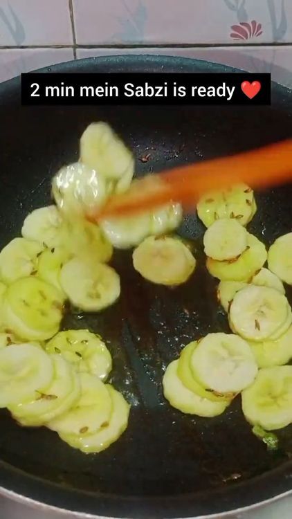 Step 1.3: Add the sliced raw bananas and toss for a few minutes