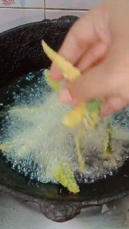 Step 1.1: Heat oil in a pan and deep fry the marinated bhindi on medium to low flame until crispy