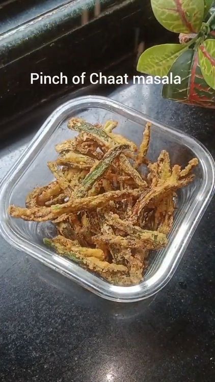 Step 1.3: Heat oil in a pan and deep fry the marinated bhindi on medium to low flame until crispy
