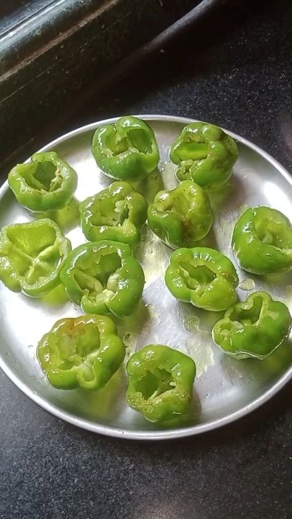Step 1.3: Cut open the caps of the capsicum and remove the seeds