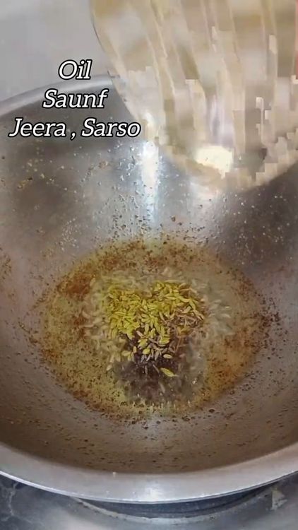 Step 2.1: Heat oil in a pan and add fennel seeds, cumin seeds, and mustard seeds
