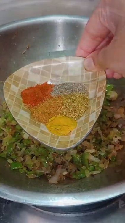 Step 2.1: Add red chilli powder, coriander powder, kitchen king masala or garam masala, turmeric powder, and black pepper powder