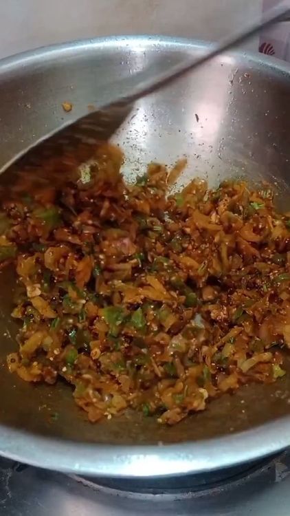 Step 2.2: Add roasted peanut powder, sugar, and chopped coriander leaves